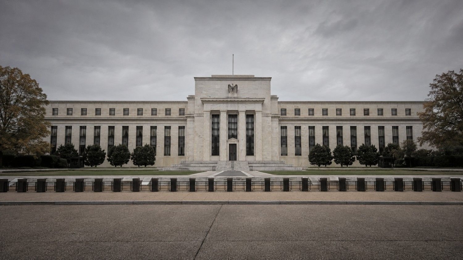 Federal Reserve Eccles Building under overcast skies, Washington D.C. — gold price FOMC minutes release July 8, 2026